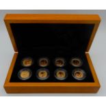 THE SOUTH AFRICAN MINT GOLD COIN COLLECTION George V sovereign 1926, George VI £1 1952, Queen
