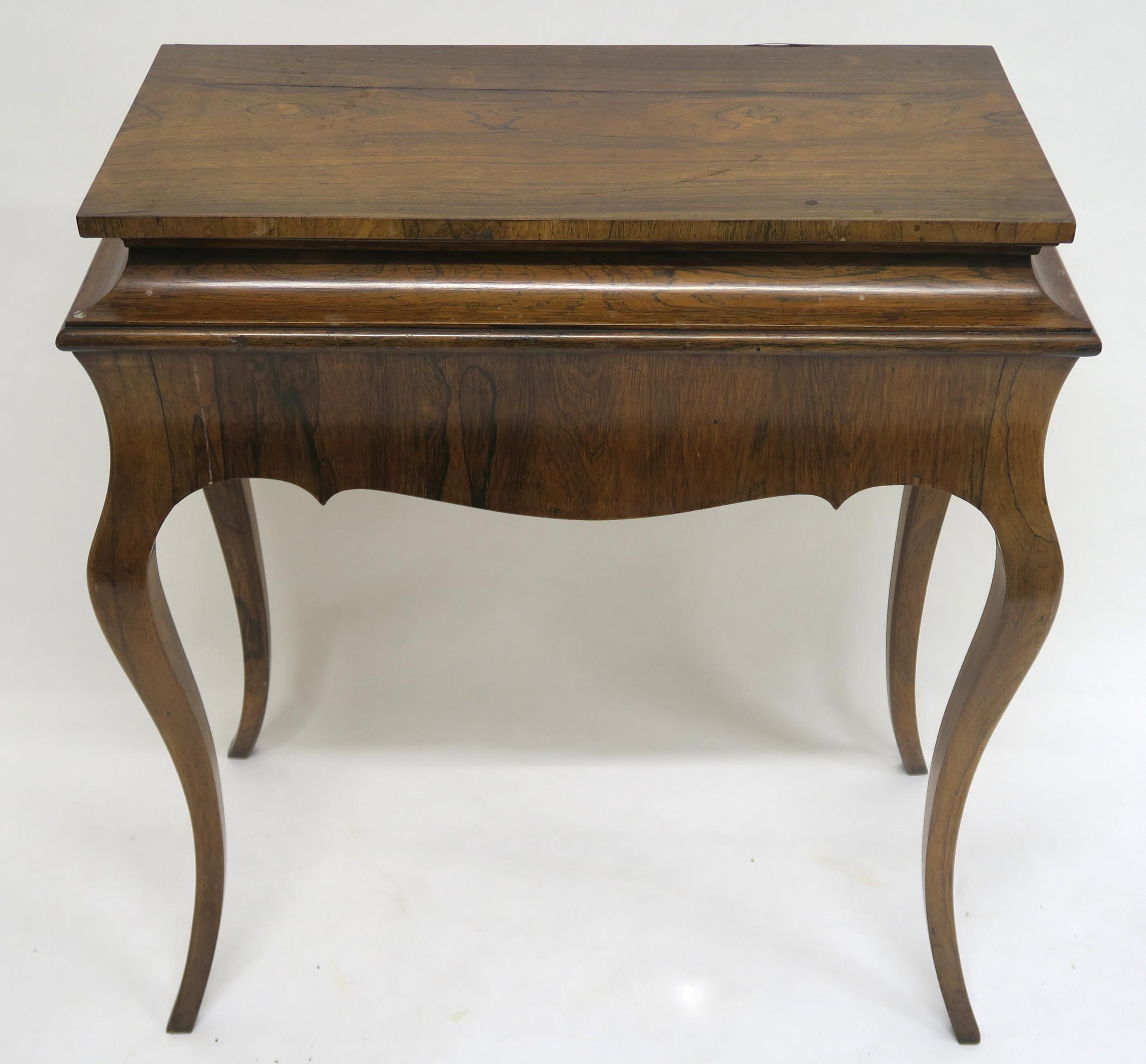 A VICTORIAN ROSEWOOD JARDINIERE TABLE with removable rosewood top over shaped frieze on cabriole