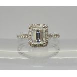 A 14K WHITE GOLD SUBSTANTIAL DIAMOND RING,  set with an estimated approx 1.40ct step cut diamond,