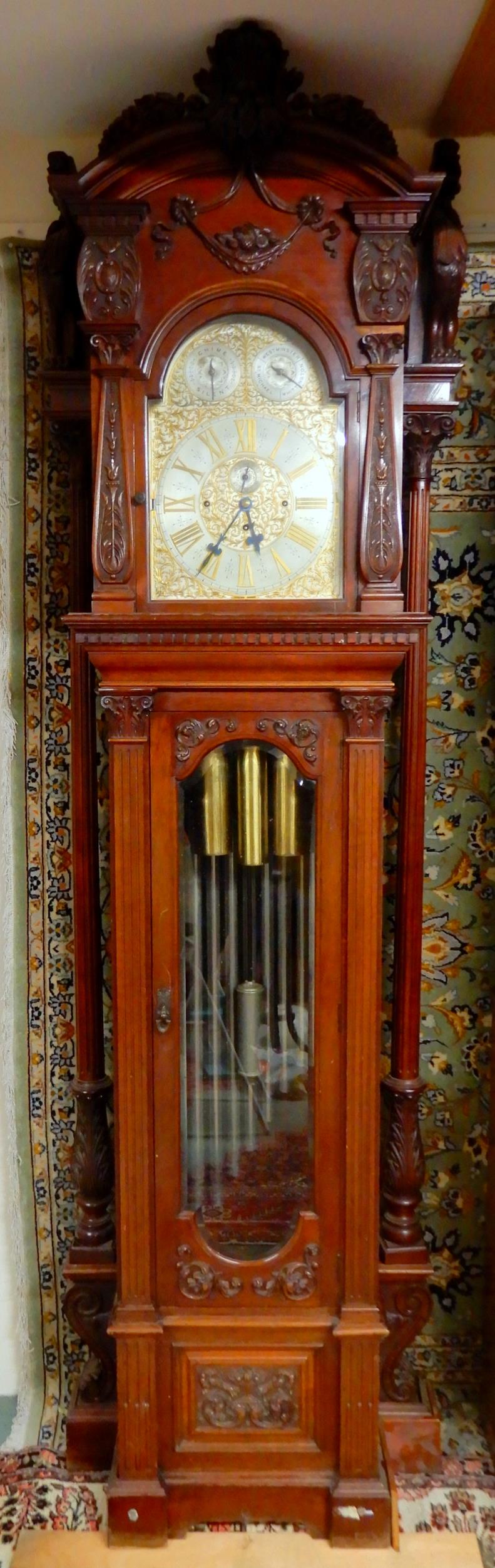 A LARGE EARLY 20TH CENTURY LONGCASE CLOCK with brass and silvered 14" dial with Roman numerals,