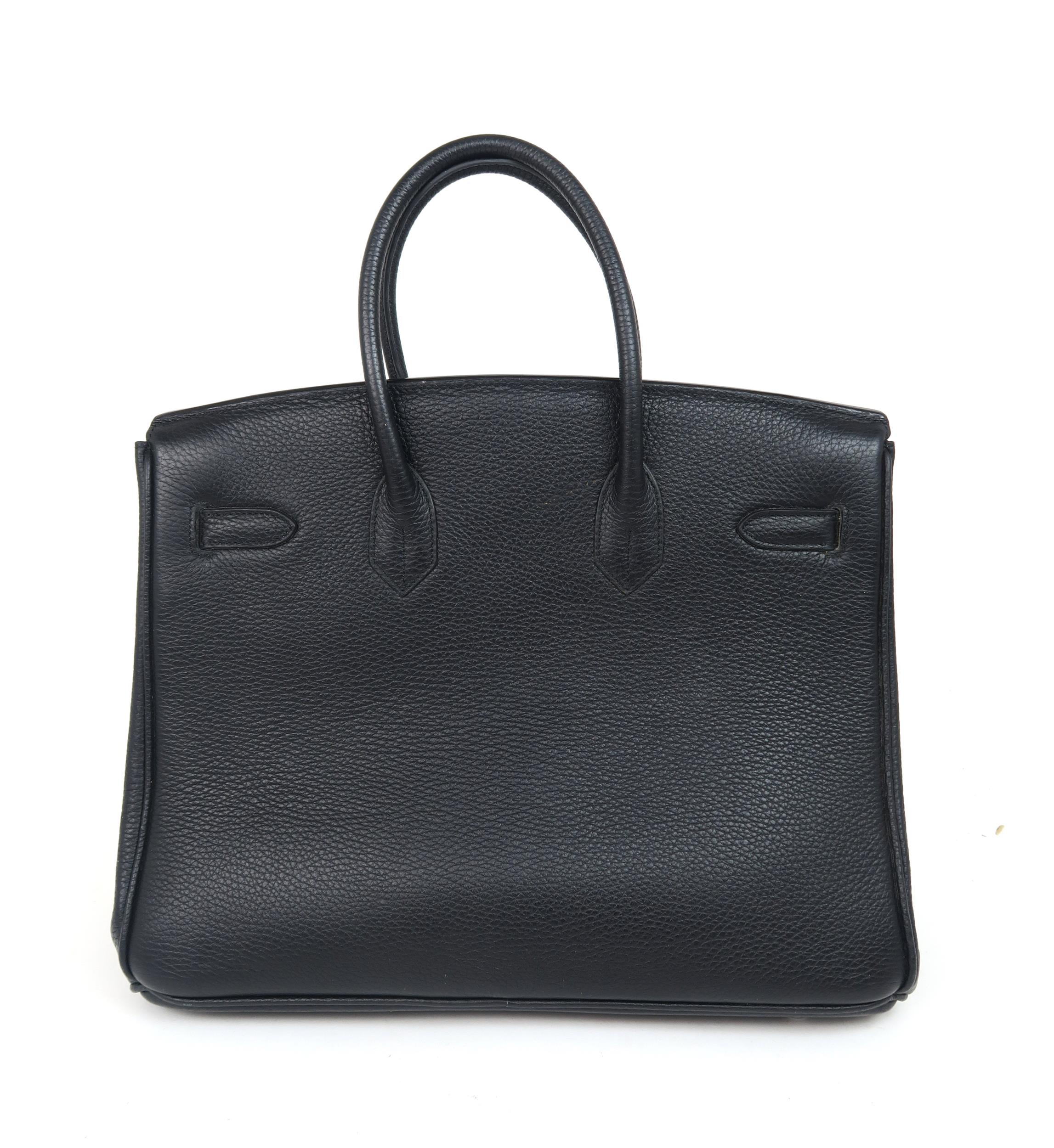 A HERMES 2010 BLACK BIRKIN 35 HANDBAG the pebbled leather exterior with dual rolled handles, top - Image 3 of 15