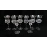 A SET OF SIX EDINBURGH CRYSTAL THISTLE SHAPED WINE GLASSES  20.5cm high, together with a pair of