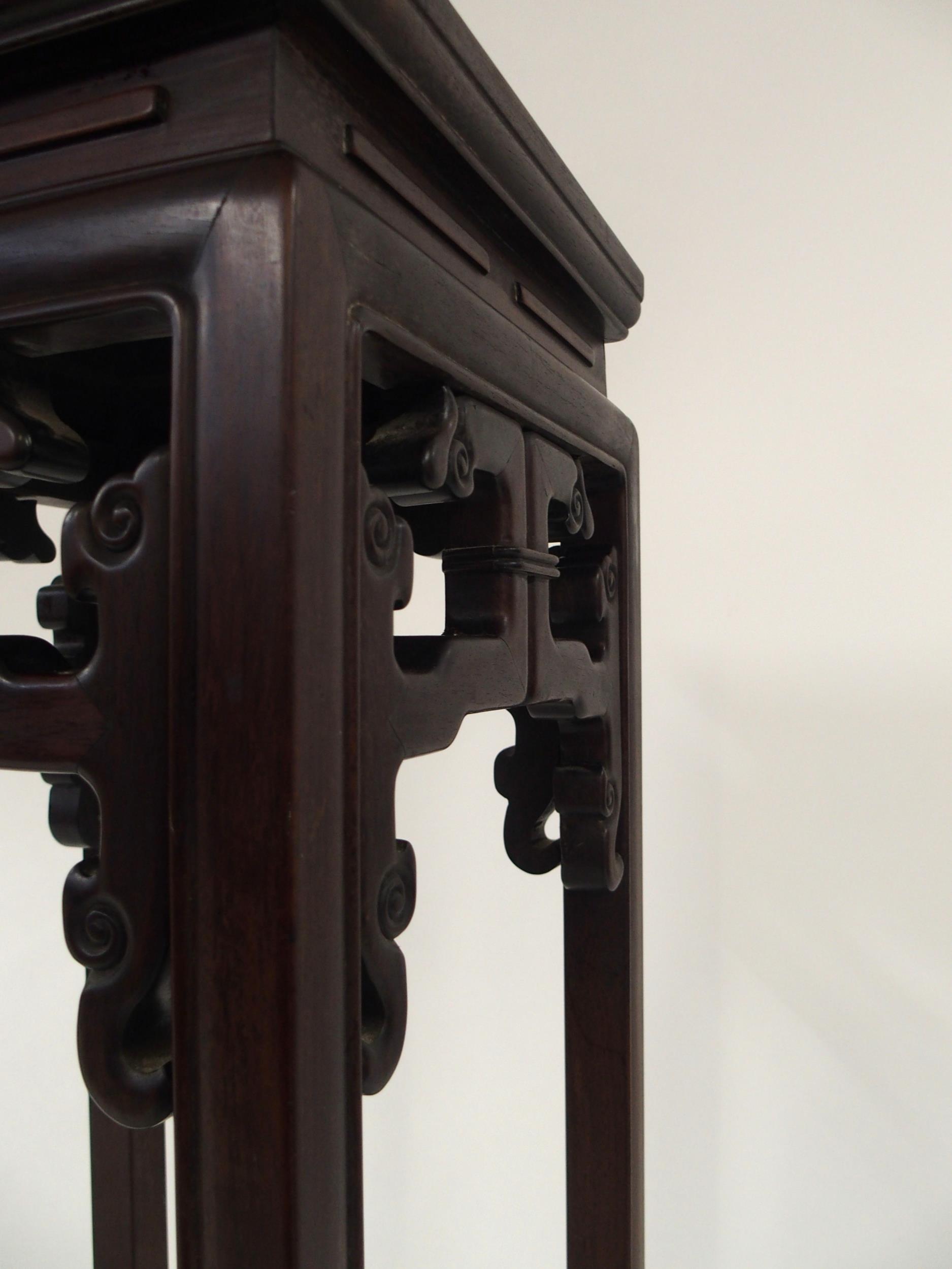 A 20TH CENTURY CHINESE HARDWOOD PLANT PEDESTAL with square top over carved fretwork friezes on - Image 3 of 8