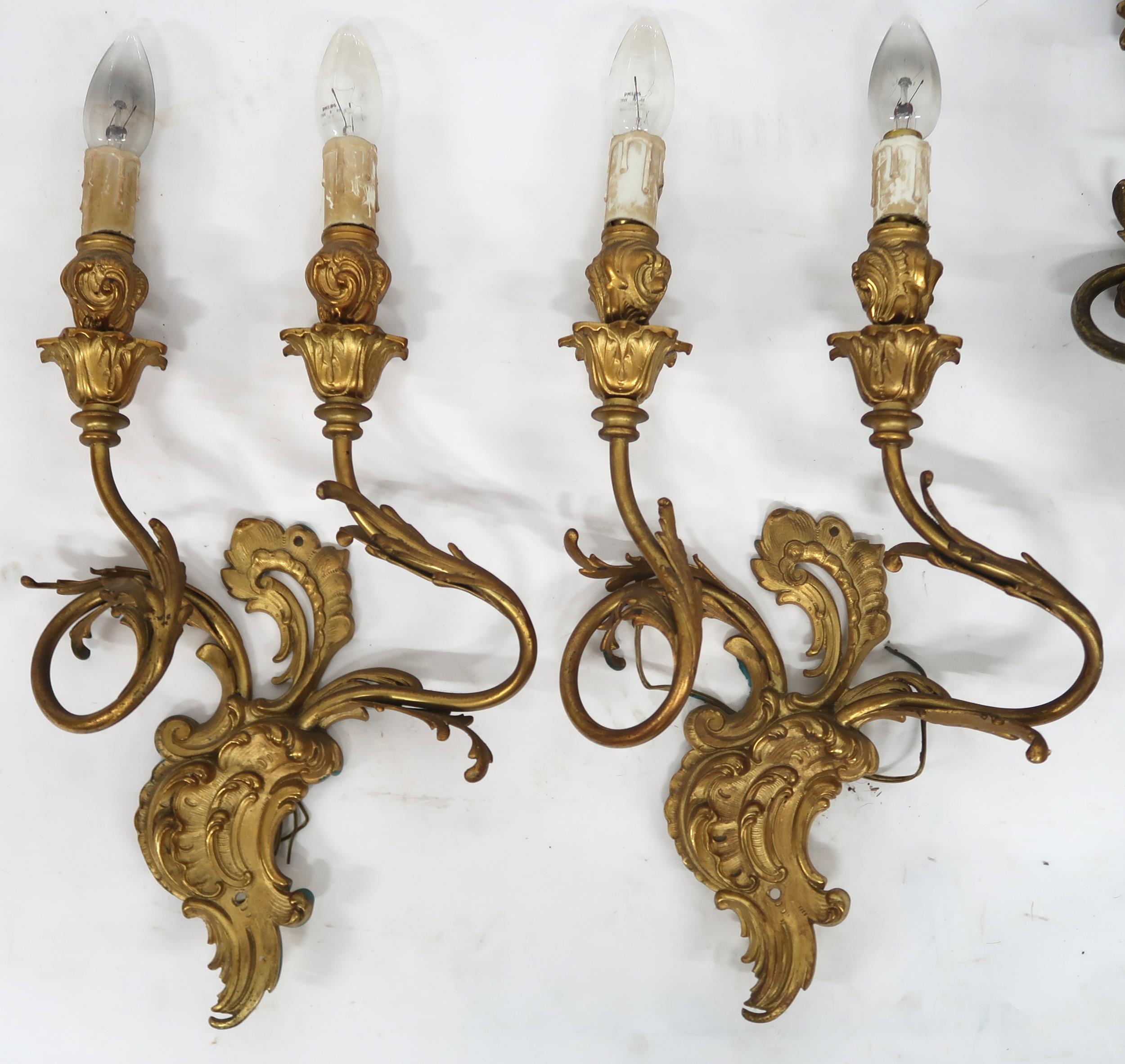 A LOT OF FIVE ROCOCO STYLE GILT METAL ORMOLU TWO BRANCH WALL SCONCES with scroll and acanthus back - Image 2 of 10