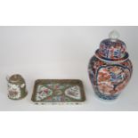 AN IMARI JAR AND COVER  Painted with foliage, 32cm high, a Canton teapot, 12cm high and tray, 25cm