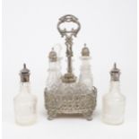 A MATCHED VICTORIAN SILVER CRUET STAND of oval form, the body of scrolling foliate openwork, on four