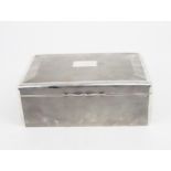 A LARGE EDWARDIAN SILVER CIGAR BOX / HUMIDOR of rounded rectangular form, the body with engine