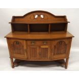 AN EARLY 20TH CENTURY BLONDE OAK ARTS & CRAFTS SIDEBOARD