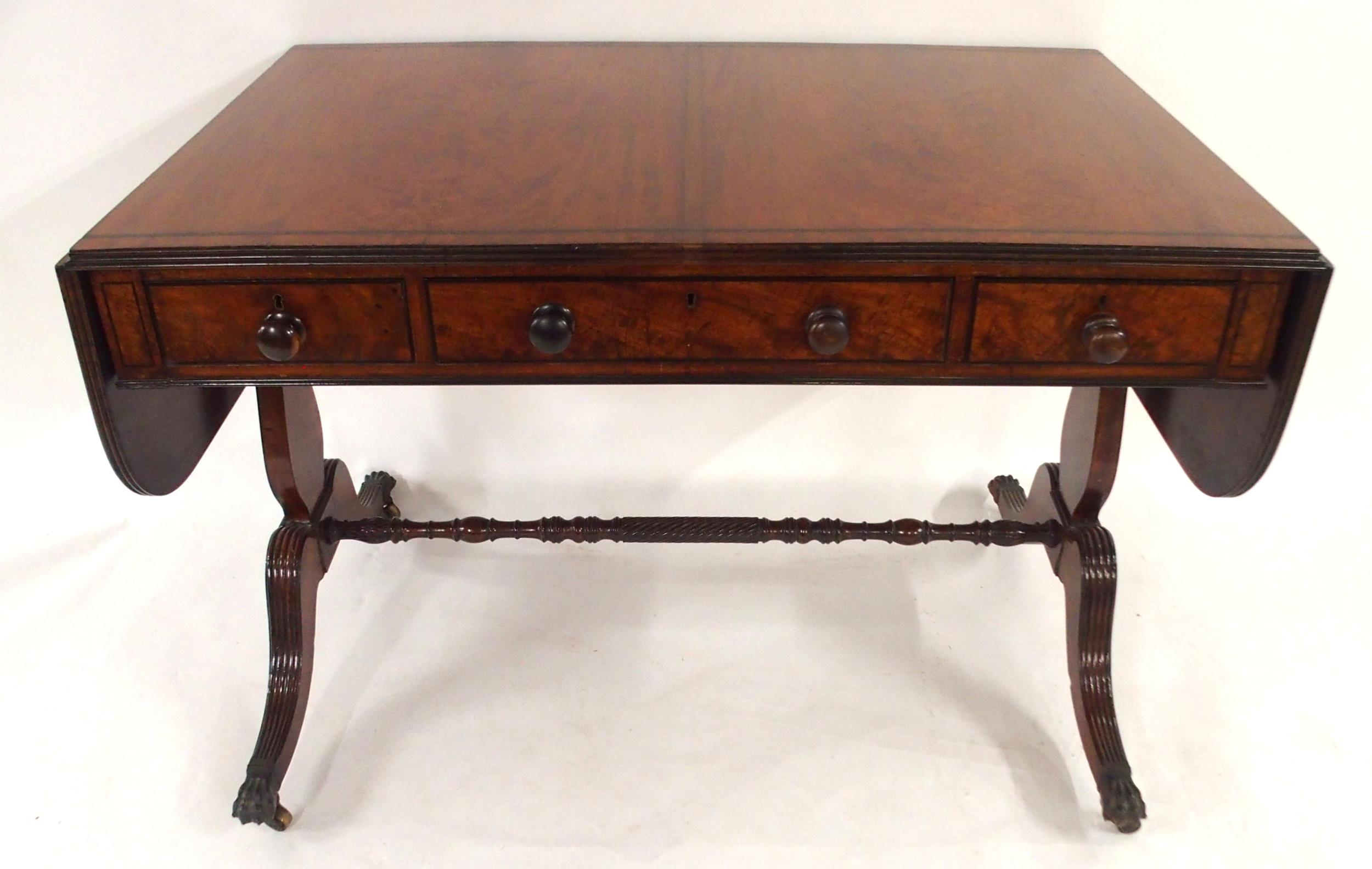 A VICTORIAN MAHOGANY DROP END SOFA TABLE stamped G Heath, Perth with long central drawer fitted with