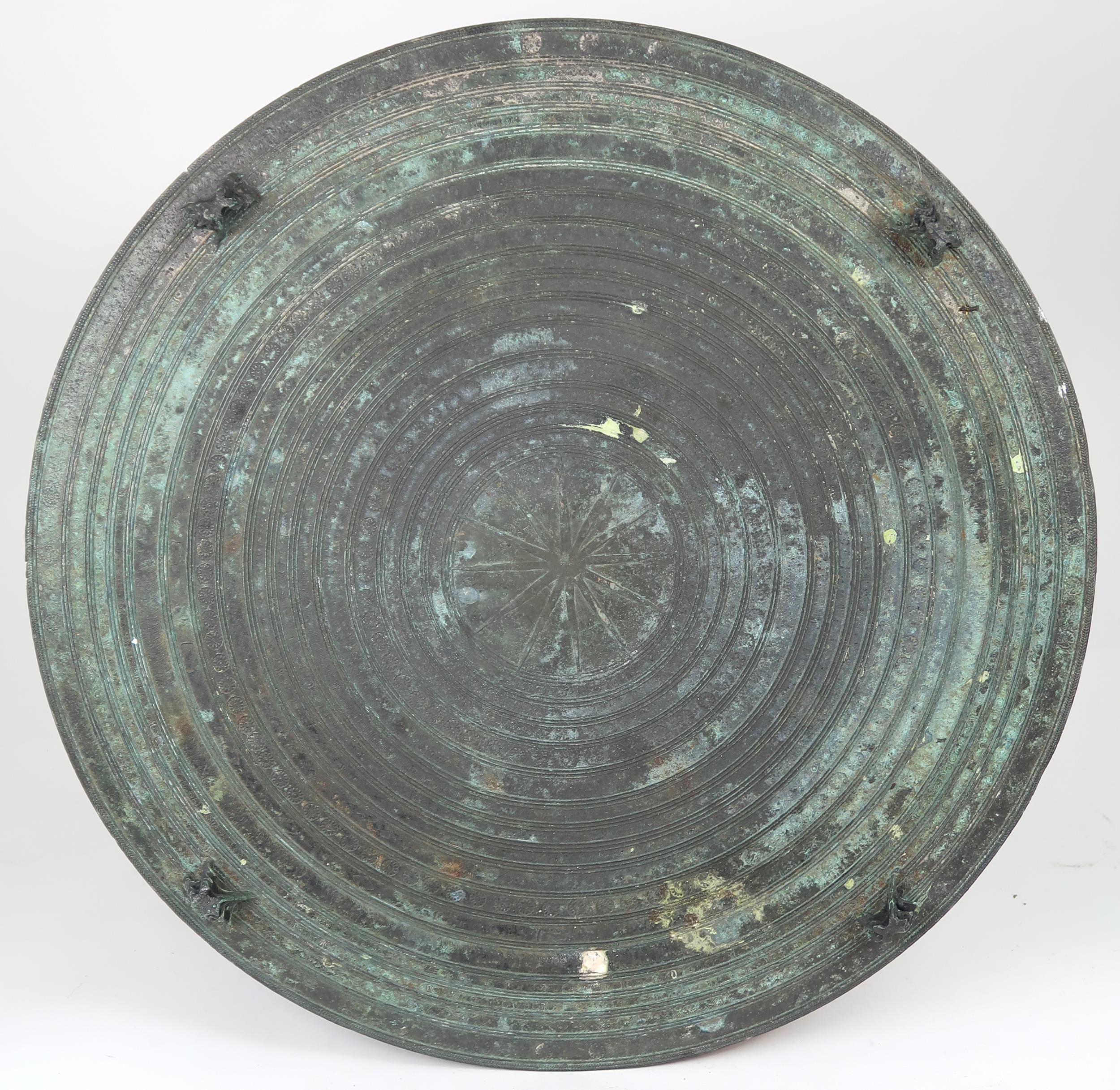 A LAOTIAN BRONZE RAIN DRUM  Of traditional type, with applied animals to top and pierced strap - Image 10 of 11