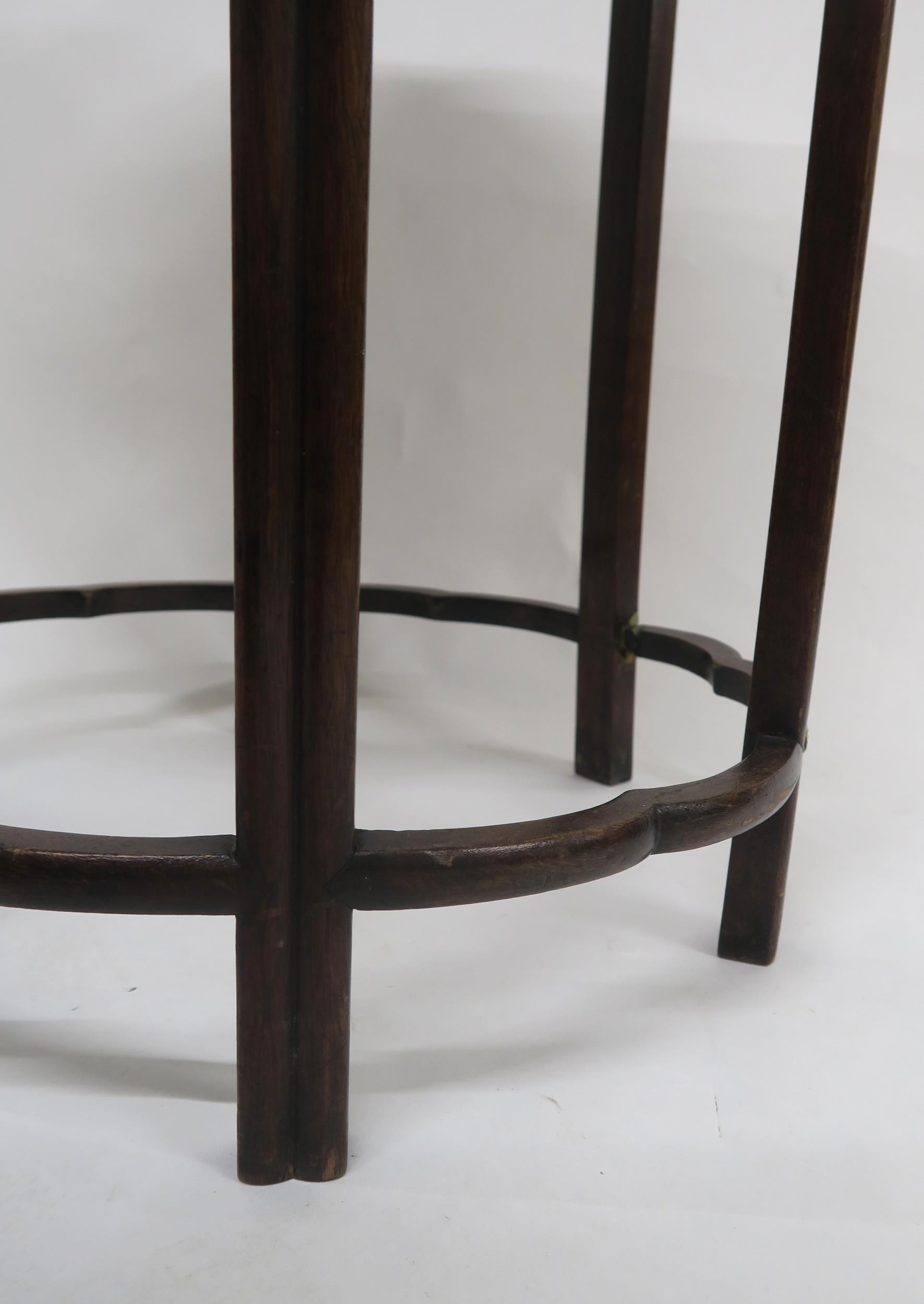 A 19TH CENTURY CHINESE HARDWOOD CIRCULAR NEST OF FOUR TABLES with shaped circular tops over carved - Image 3 of 7