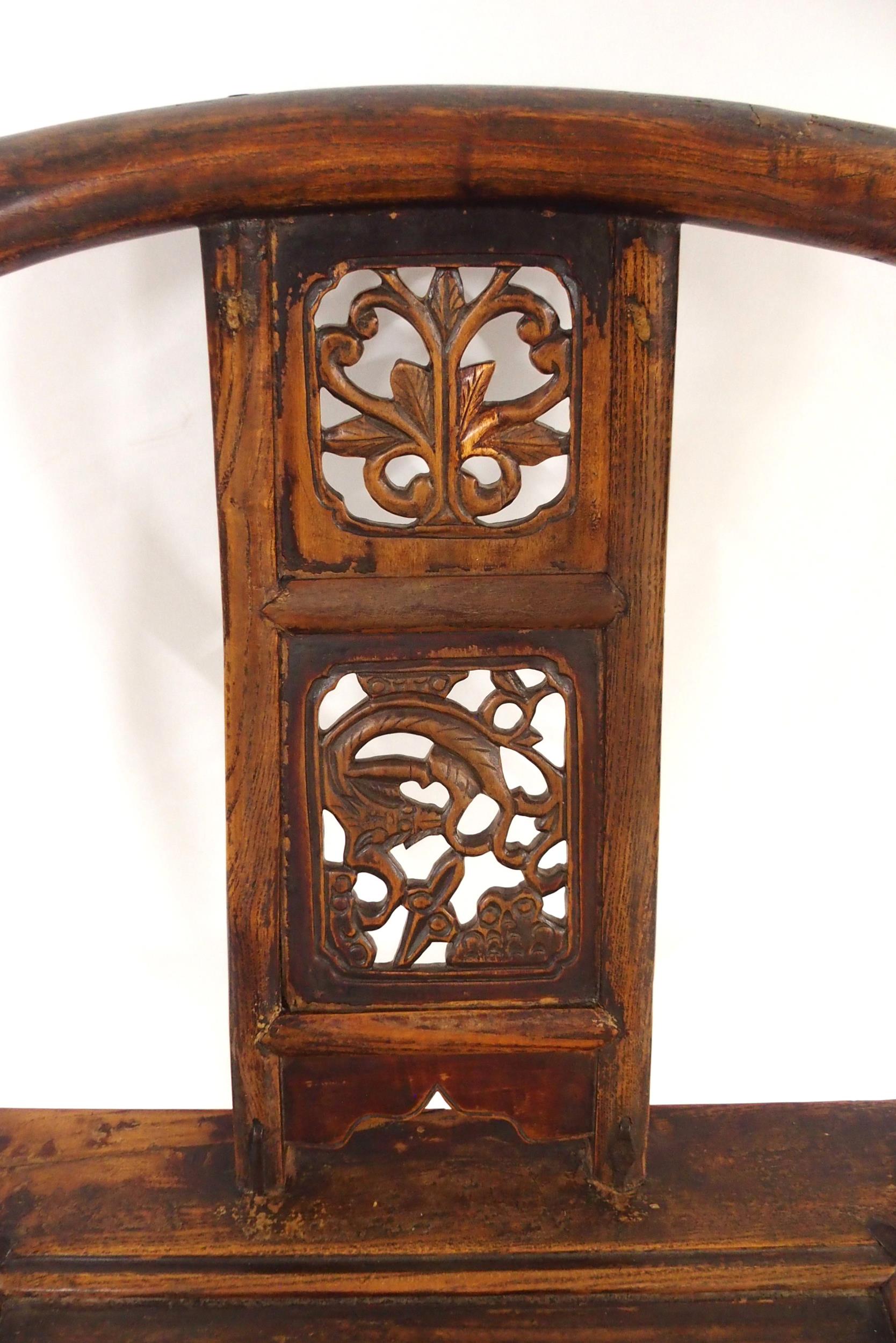 A CHINESE HARDWOOD HORSESHOE SHAPED ARMCHAIR with carved fret work splat on stretchered supports - Image 6 of 7