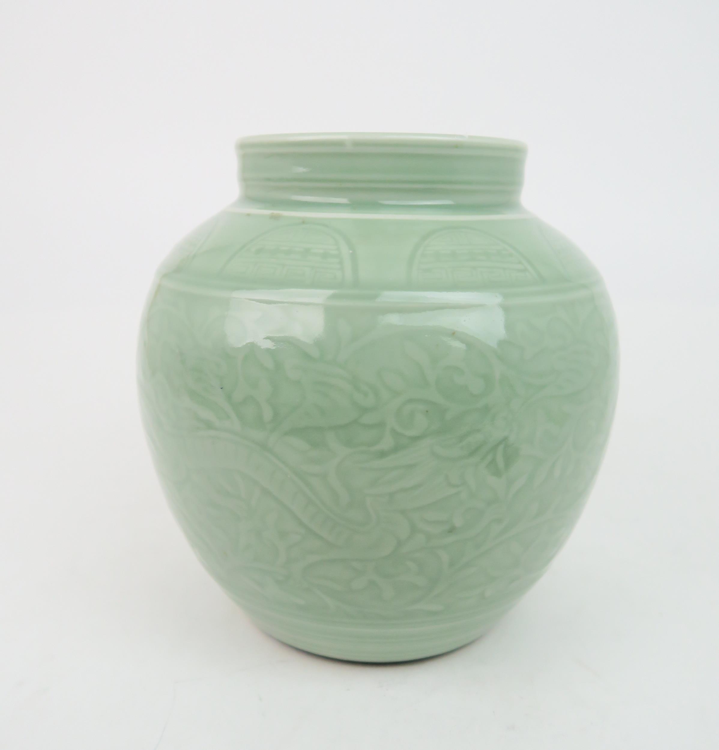 A CHINESE CELADON VASE  Carved with an archaic band above scrolling foliage, and horizontal banding, - Image 4 of 12