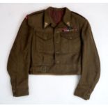 A SCARCE WW2 POLISH PARATROOPER'S KHAKI SERGE BATTLEDRESS TUNIC  With epaulette rank insignia for