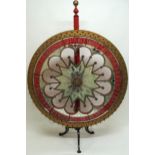 AN EARLY 20TH CENTURY H.C. EVANS & CO MAKERS CHICAGO GAMBLING WHEEL with central engraved