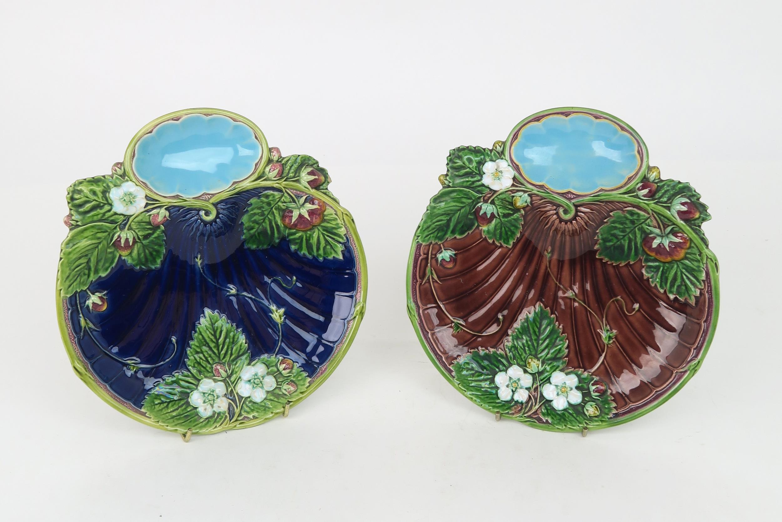 TWO MINTON MAJOLICA STRAWBERRY DISHES shape no 1330, with impressed marks to base, 21.5cm diameter