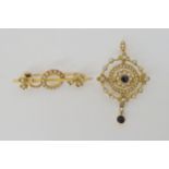 AN EDWARDIAN PENDANT AND BROOCH the pendant is set with amethysts and split pearls, mounted in