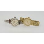 TWO LADIES OMEGA WATCHES A 9ct gold Quartz 1450, cream coloured dial with black Arabic numerals, and