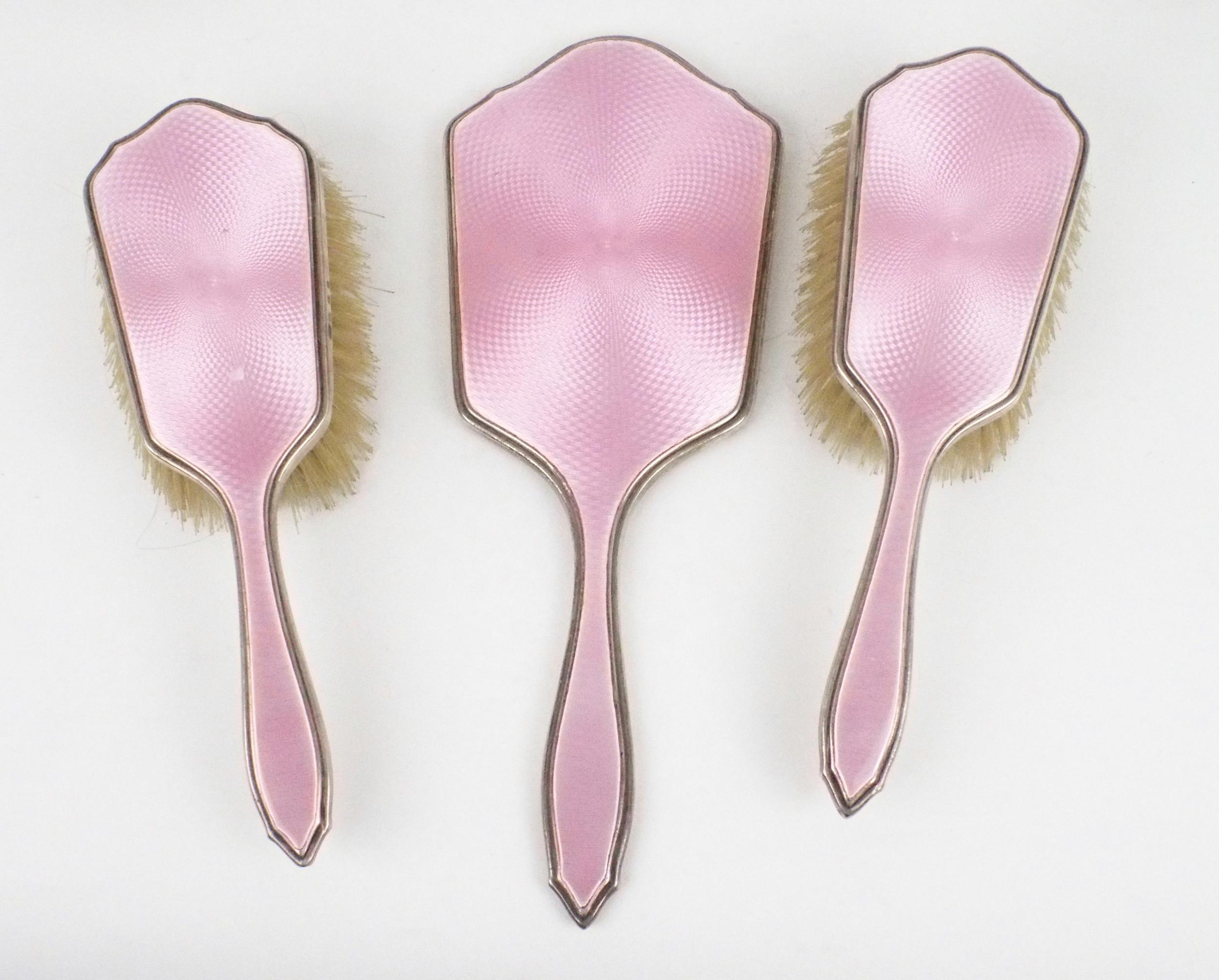 A GEORGE V TEN PIECE SILVER AND GUILLOCHE ENAMEL DRESSING SET comprising two clothes brushes, two - Image 2 of 10