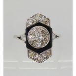 AN OLD CUT DIAMOND AND ONYX RING the white metal mount is set with estimated approx 0.40cts of old