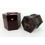 A LACHANEL & Co. PATENT CONCERTINA With fret-cut rosewood ends, serial no. 44708, contained in a