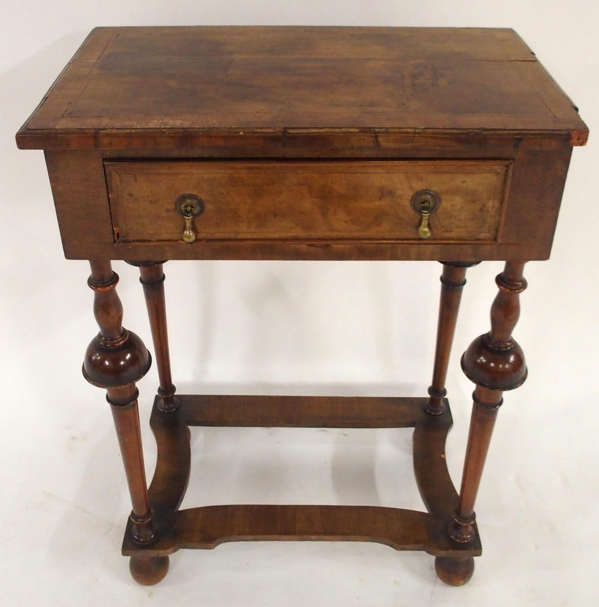 A GEORGIAN WALNUT SINGLE DRAWER OCCASIONAL TABLE on turned stretchered supports, 70cm high x 51cm