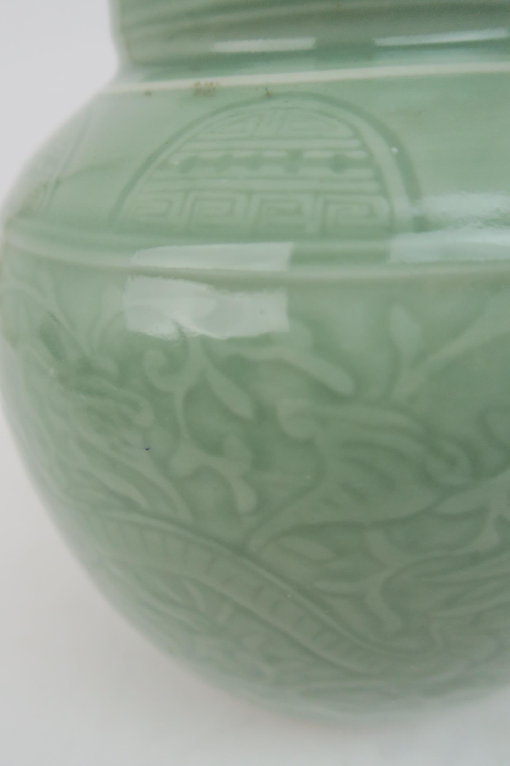 A CHINESE CELADON VASE  Carved with an archaic band above scrolling foliage, and horizontal banding, - Image 6 of 12