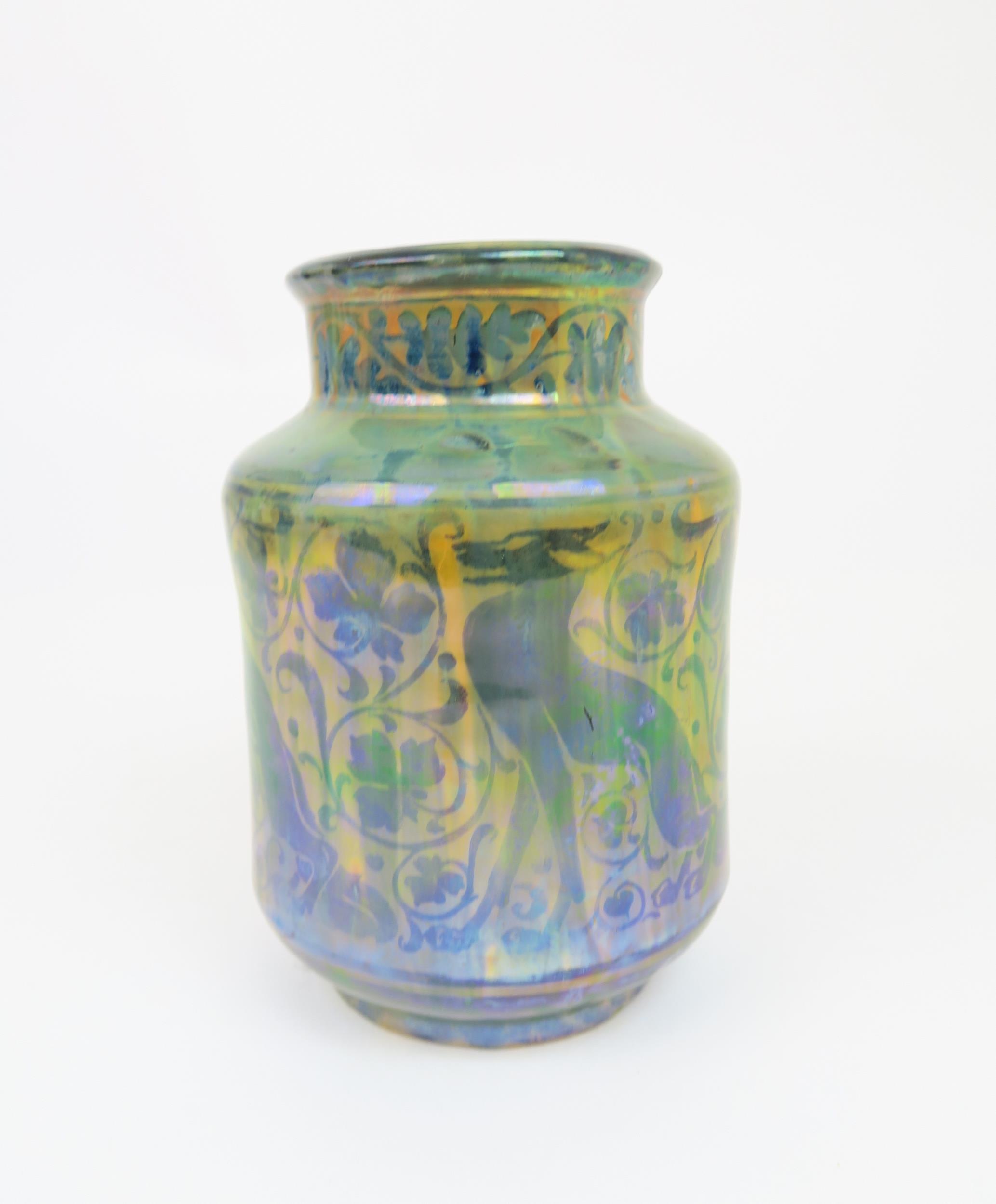 A ROYAL LANCASTRIAN LUSTRE VASE designed by Richard Joyce, the body painted with stylised foxes