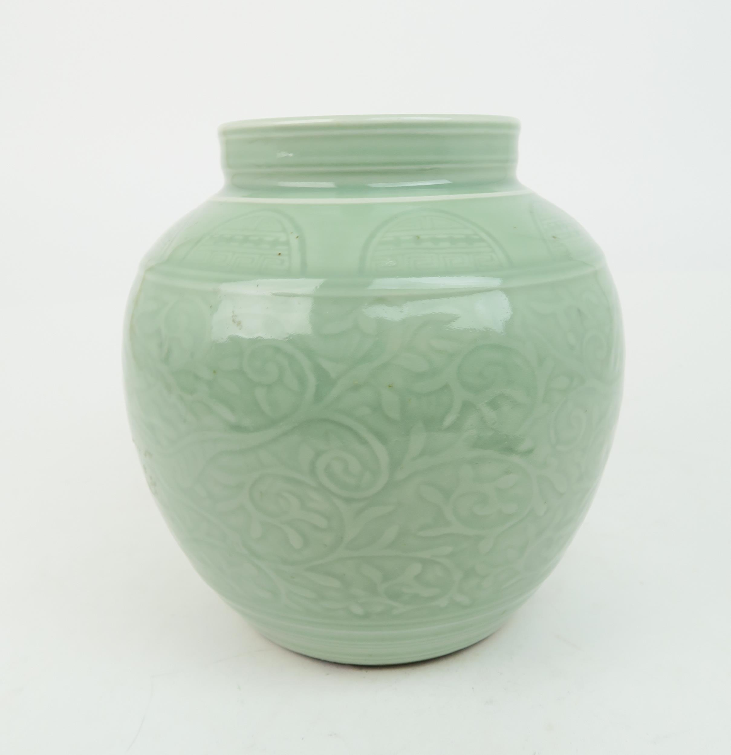 A CHINESE CELADON VASE  Carved with an archaic band above scrolling foliage, and horizontal banding, - Image 3 of 12