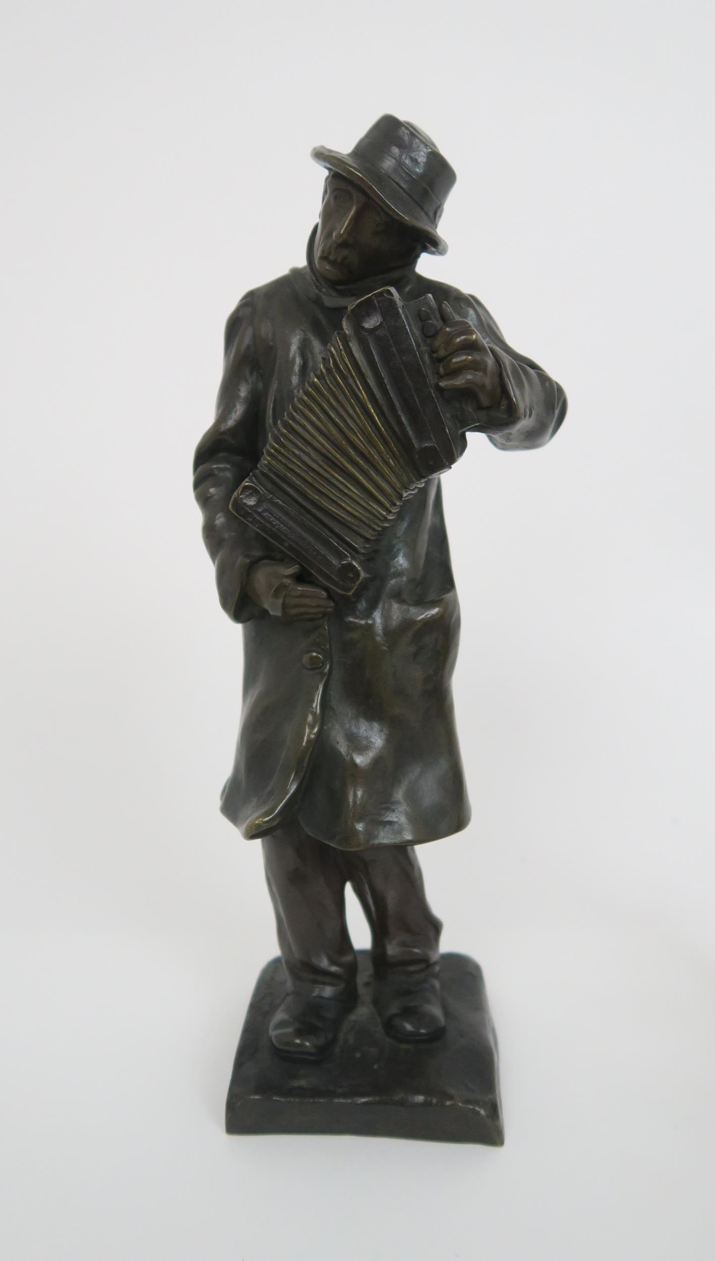 ALBERT POMMIER (1880-1943) The Accordion player, bronze, signed to the base, and with foundry