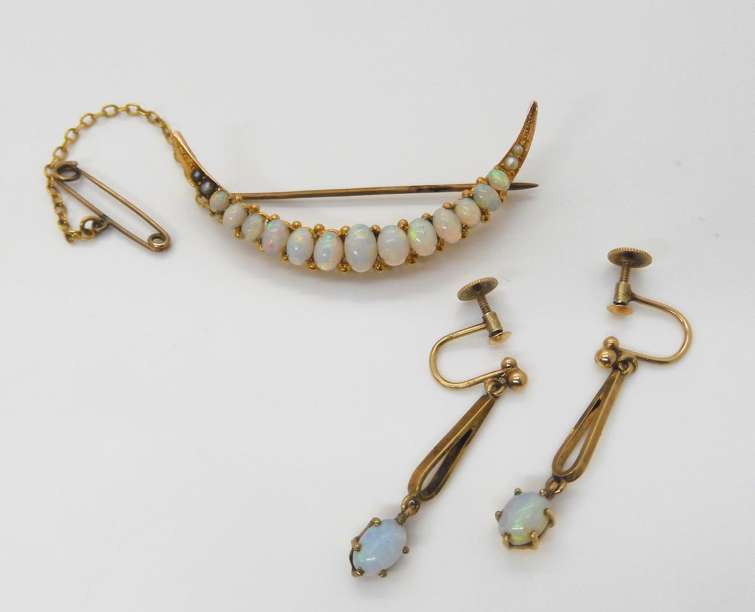 AN OPAL CRESCENT BROOCH & EARRINGS the brooch set with oval cabochon opals, largest approx 6mm x 4mm - Image 2 of 3