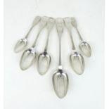 EXETER; a George IV silver basting spoon, three silver serving spoons and two silver dessert