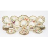 A NAUTILUS PORCELAIN TEASET with hand painted decoration of flowers, comprising a cake plate, twelve