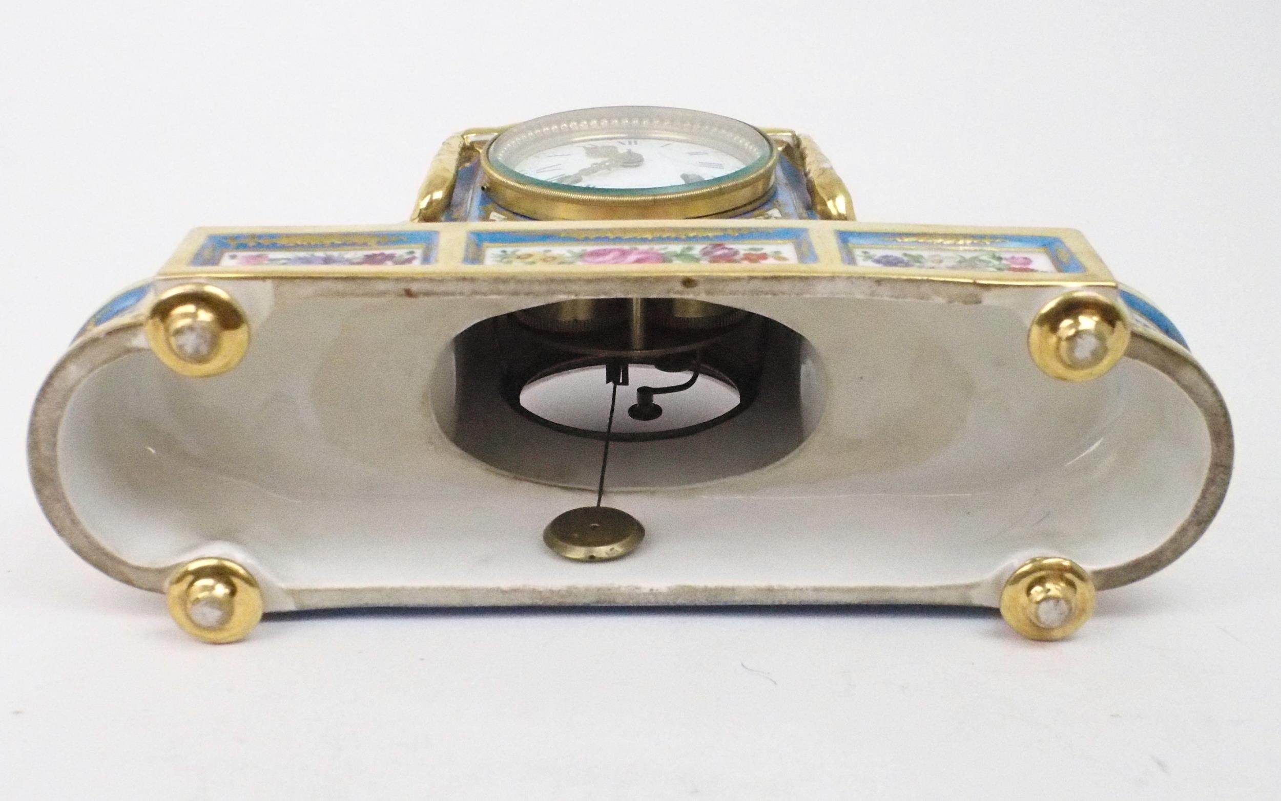 A SEVRES STYLE PORCELAIN MANTLE CLOCK the circular white enamel dial, with blue roman numerals and - Image 9 of 12