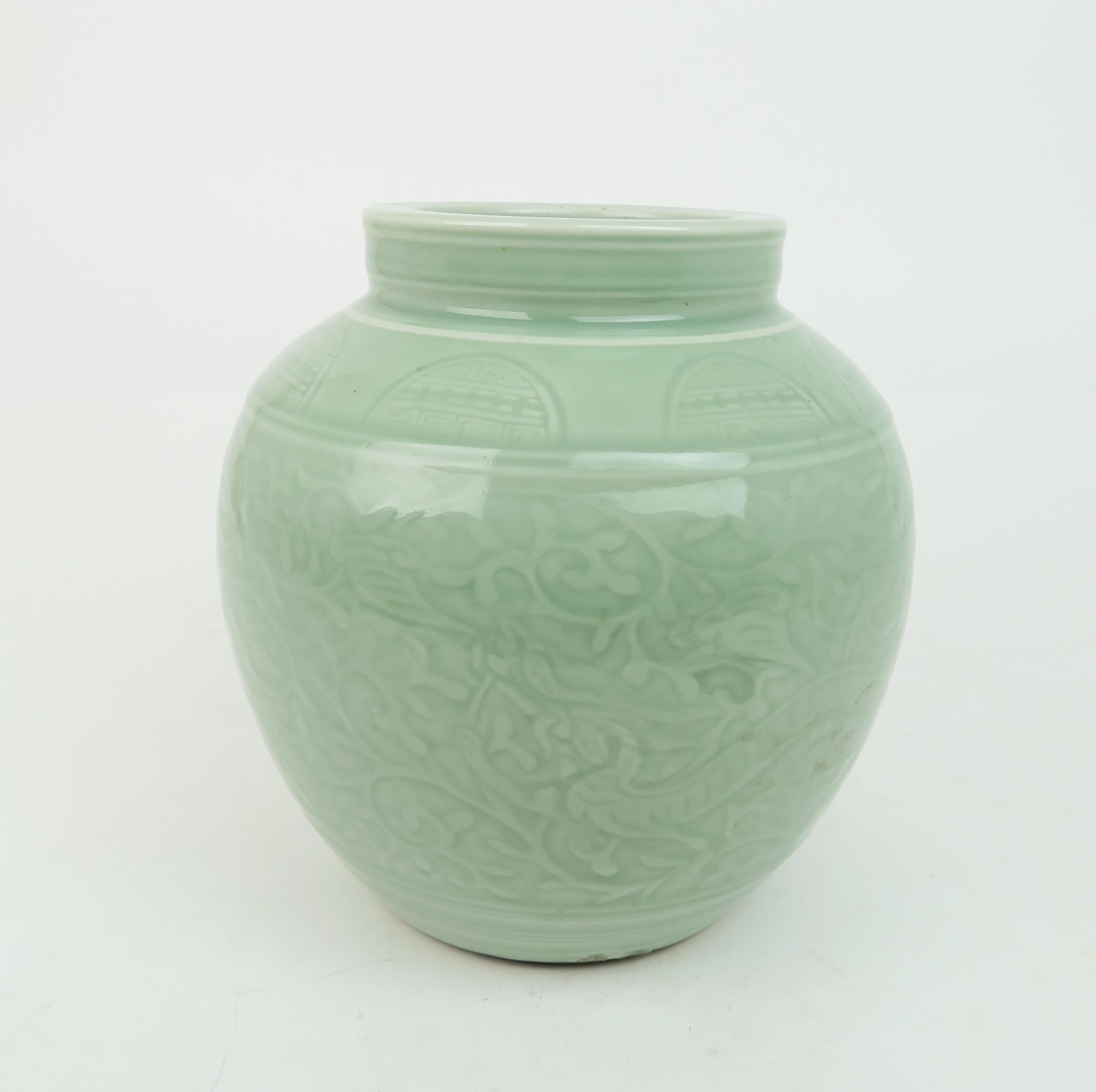 A CHINESE CELADON VASE  Carved with an archaic band above scrolling foliage, and horizontal banding, - Image 2 of 12