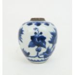 A CHINESE BLUE AND WHITE JAR Painted with acanthus and within stiff leaf bands, 18th century, 13cm