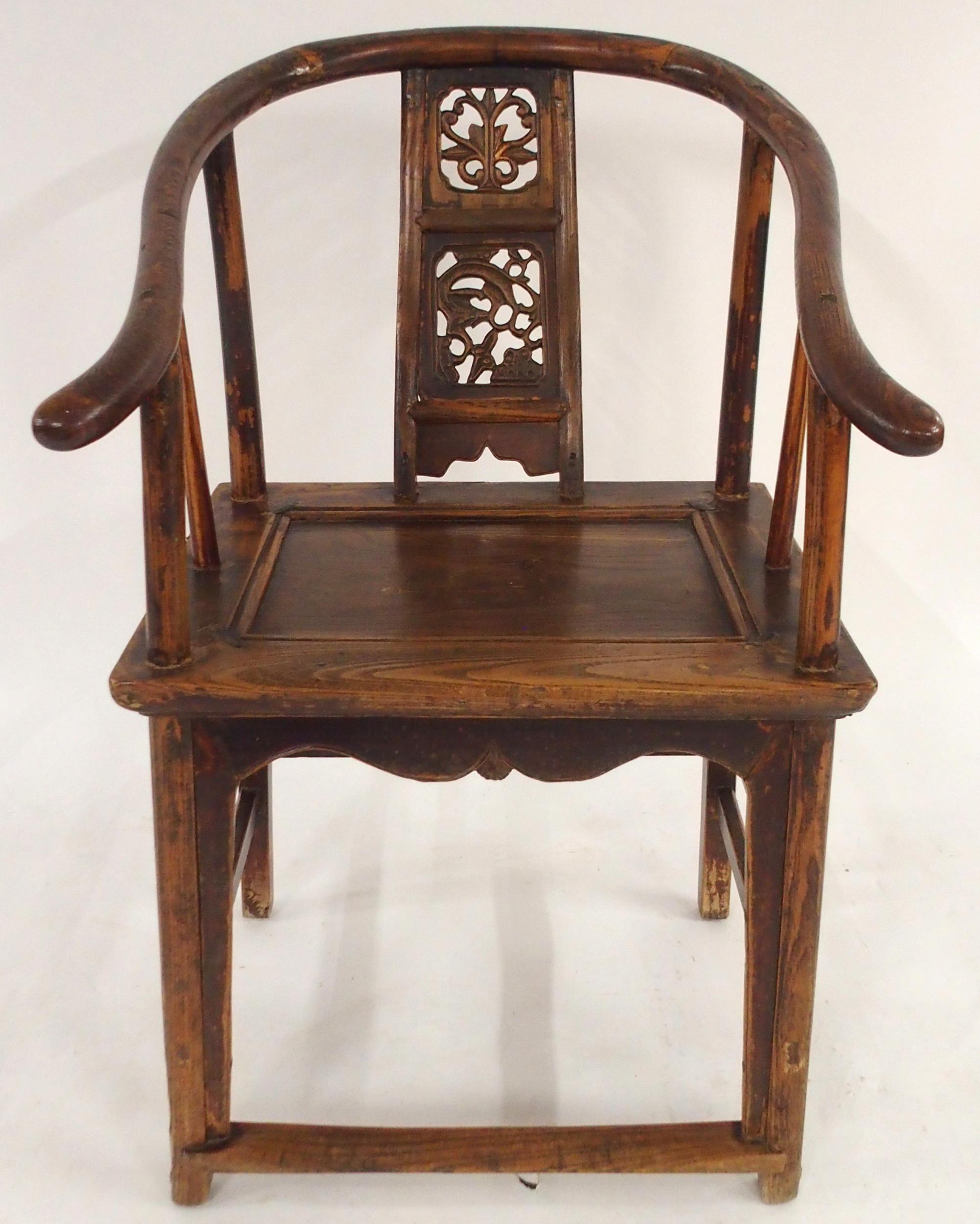 A CHINESE HARDWOOD HORSESHOE SHAPED ARMCHAIR with carved fret work splat on stretchered supports - Image 7 of 7