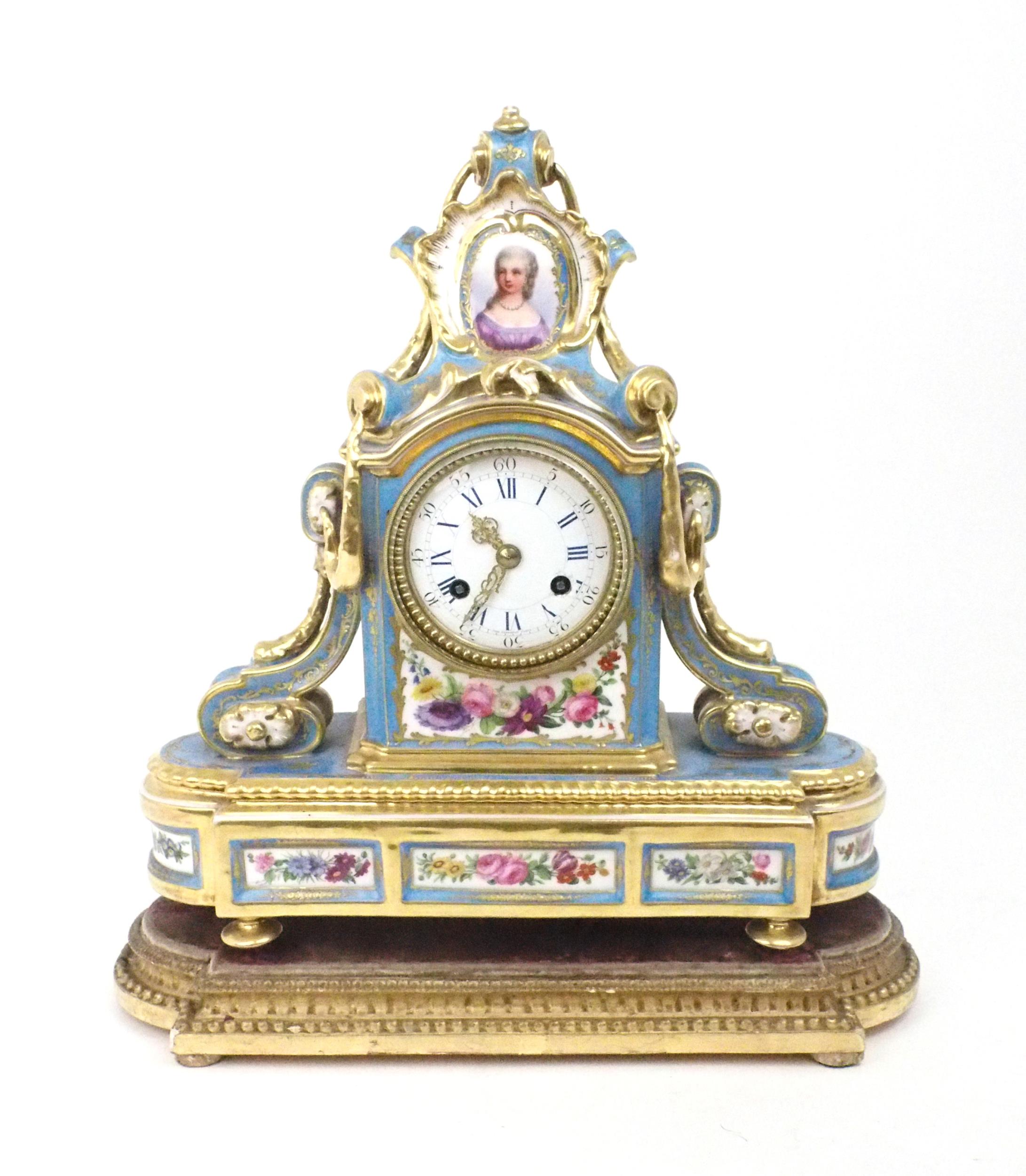 A SEVRES STYLE PORCELAIN MANTLE CLOCK the circular white enamel dial, with blue roman numerals and