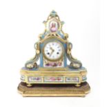 A SEVRES STYLE PORCELAIN MANTLE CLOCK the circular white enamel dial, with blue roman numerals and