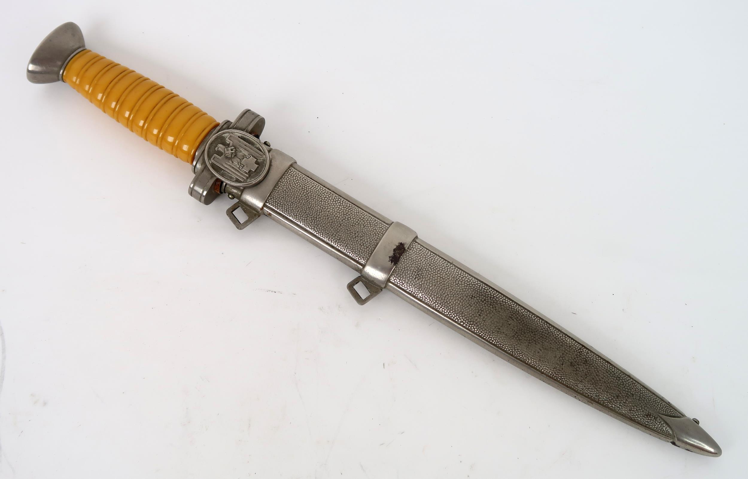 A THIRD REICH RED CROSS LEADERS DAGGER With unmarked polished double edged blade, original black