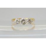 A THREE STONE DIAMOND RING mounted throughout in 18ct gold, and set with estimated approx 0.91cts in