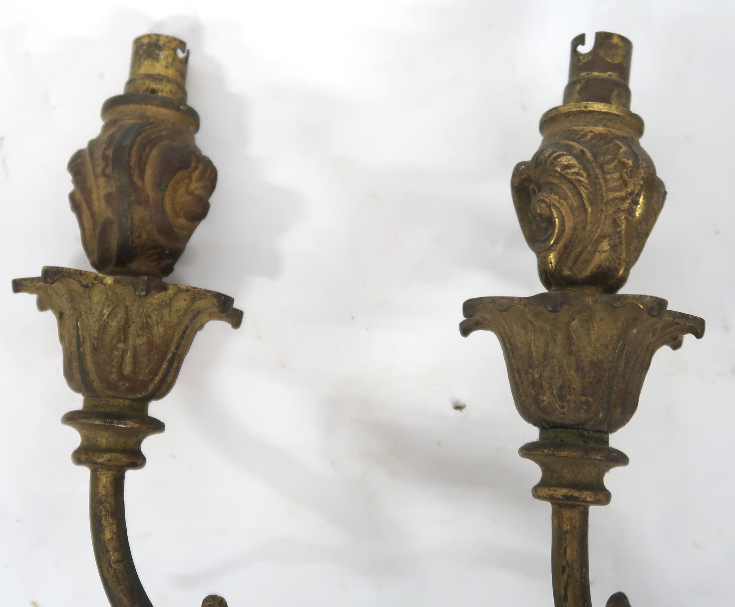 A LOT OF FIVE ROCOCO STYLE GILT METAL ORMOLU TWO BRANCH WALL SCONCES with scroll and acanthus back - Image 9 of 10