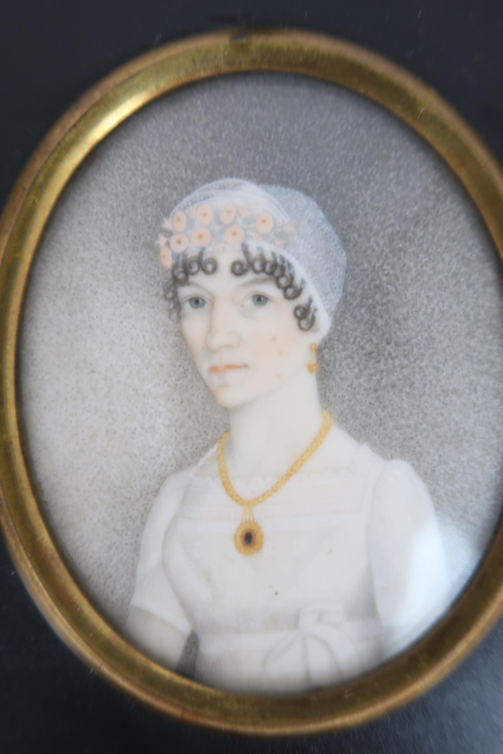 THREE REGENCY PORTRAIT MINIATURES PAINTED ON IVORY In ebonised frames, comprising a lady with - Image 10 of 11