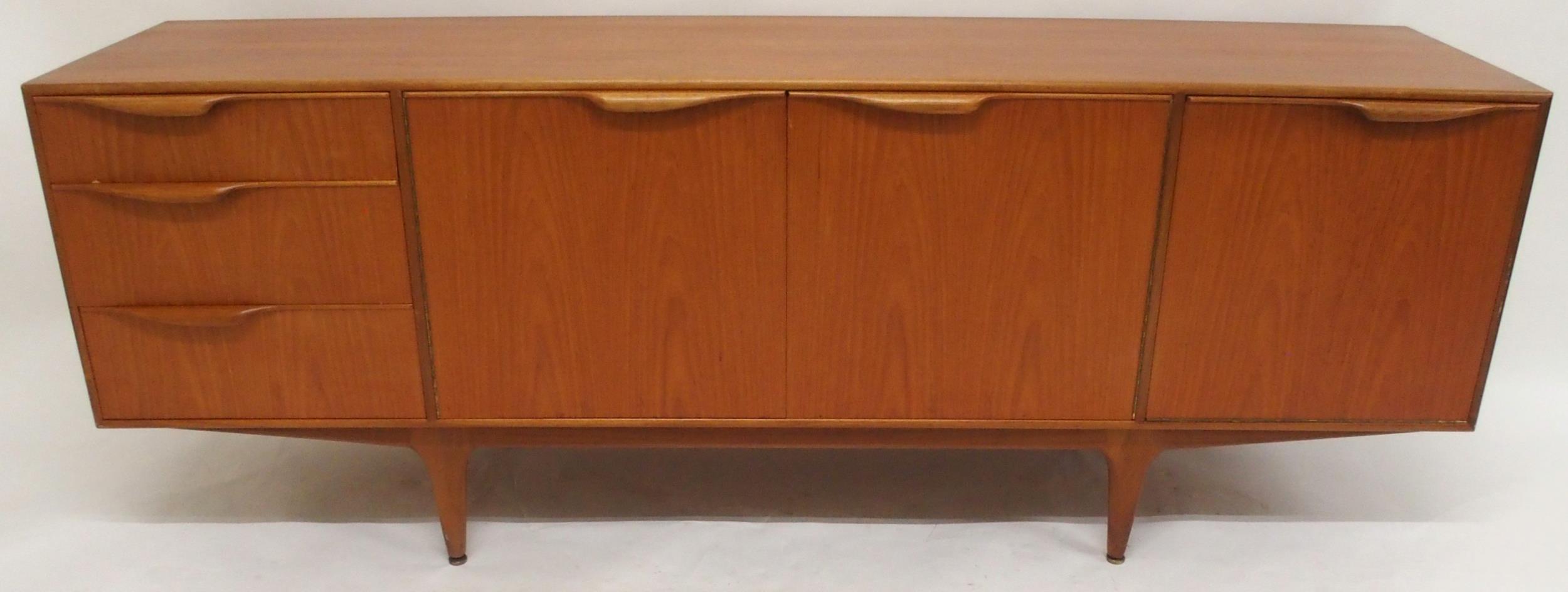 A MID 20TH CENTURY TEAK A.H. MCINTOSH OF KIRKCALDY SIDEBOARD with pair of cabinet doors flanked by