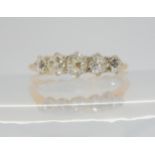 A FIVE STONE DIAMOND RING set with estimated approx 0.60cts of old cut diamonds. Finger size O1/2,