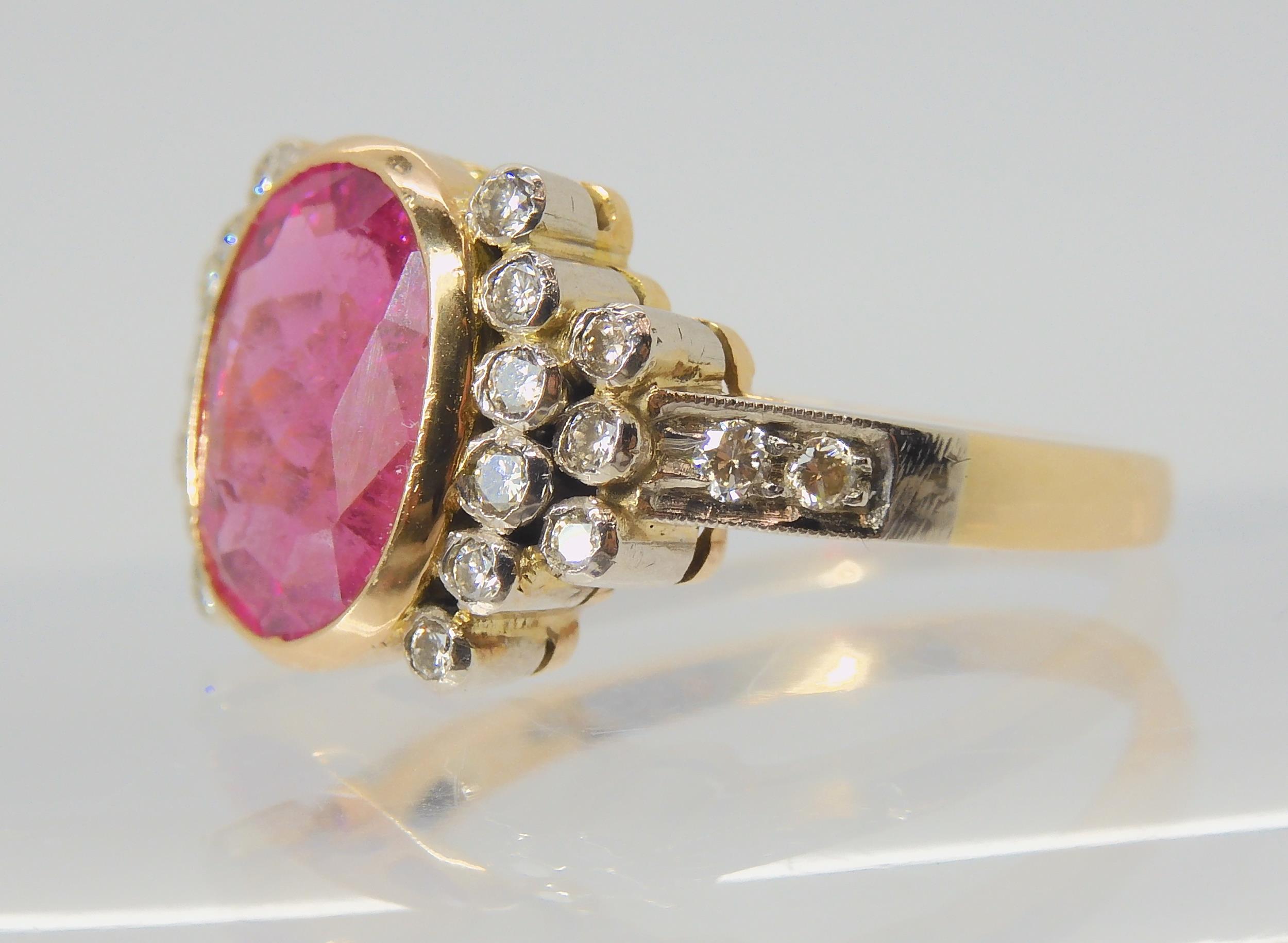 A PINK TOURMALINE AND DIAMOND RING the mount is stamped 750 for 18ct, and set with a 10.8mm x 8. - Image 5 of 10