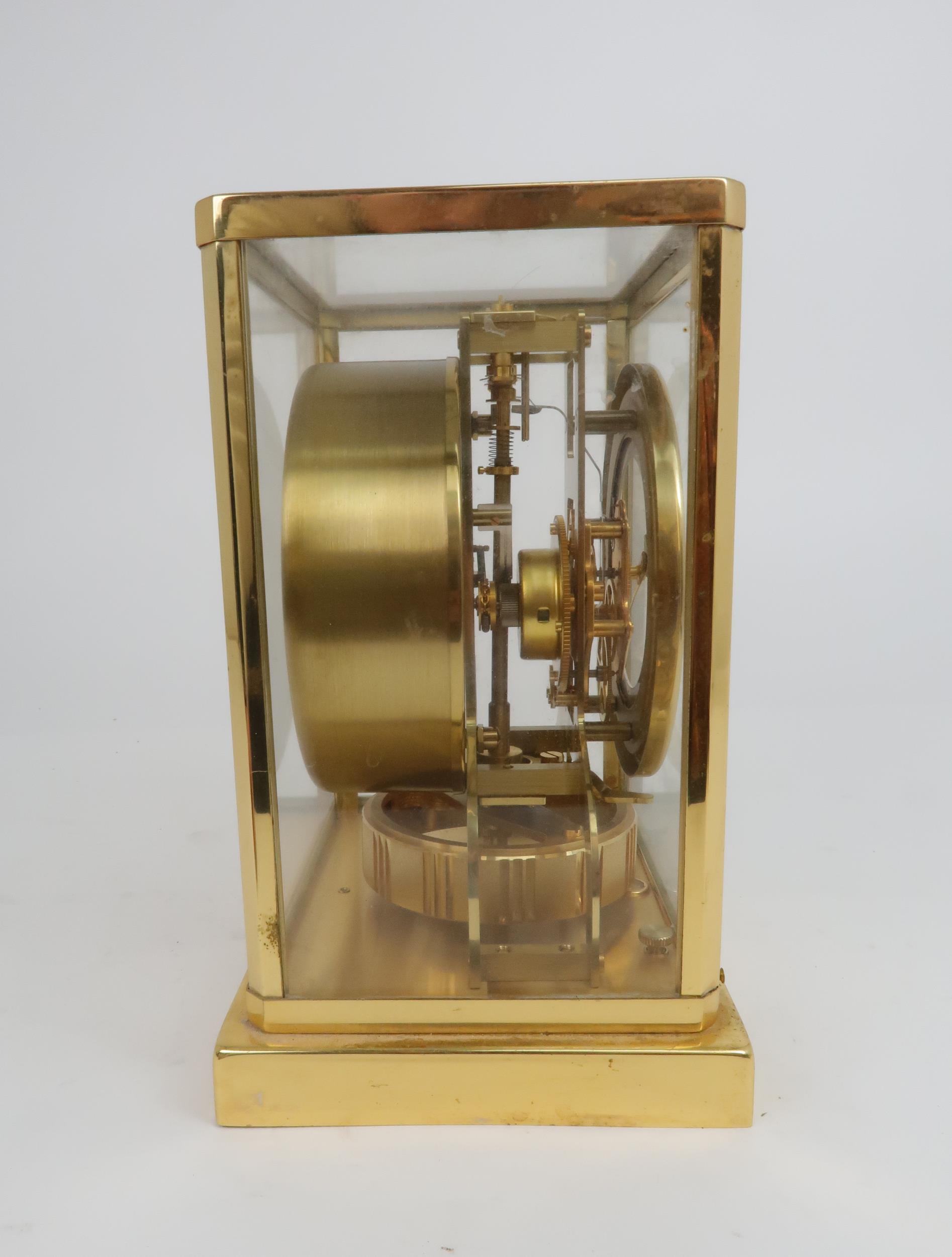 A JAEGER LE COULTRE ATMOS CLOCK in glazed brass case, the white enamel chapter ring with applied - Image 4 of 5