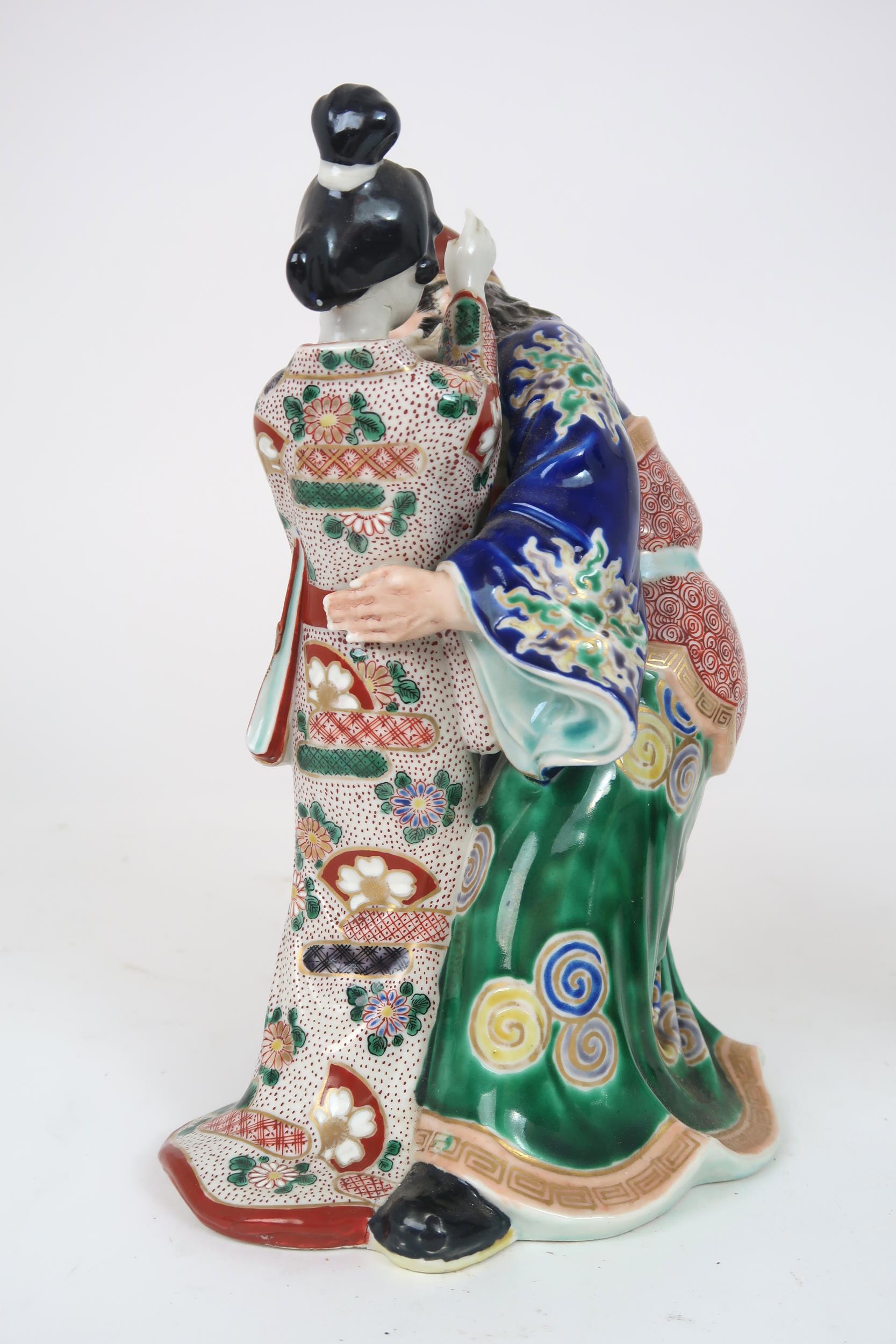 AN ARITA MODEL OF A WARRIOR AND GEISHA  She slapping his face and he grimacing, 25cm high, a Chinese - Image 6 of 18