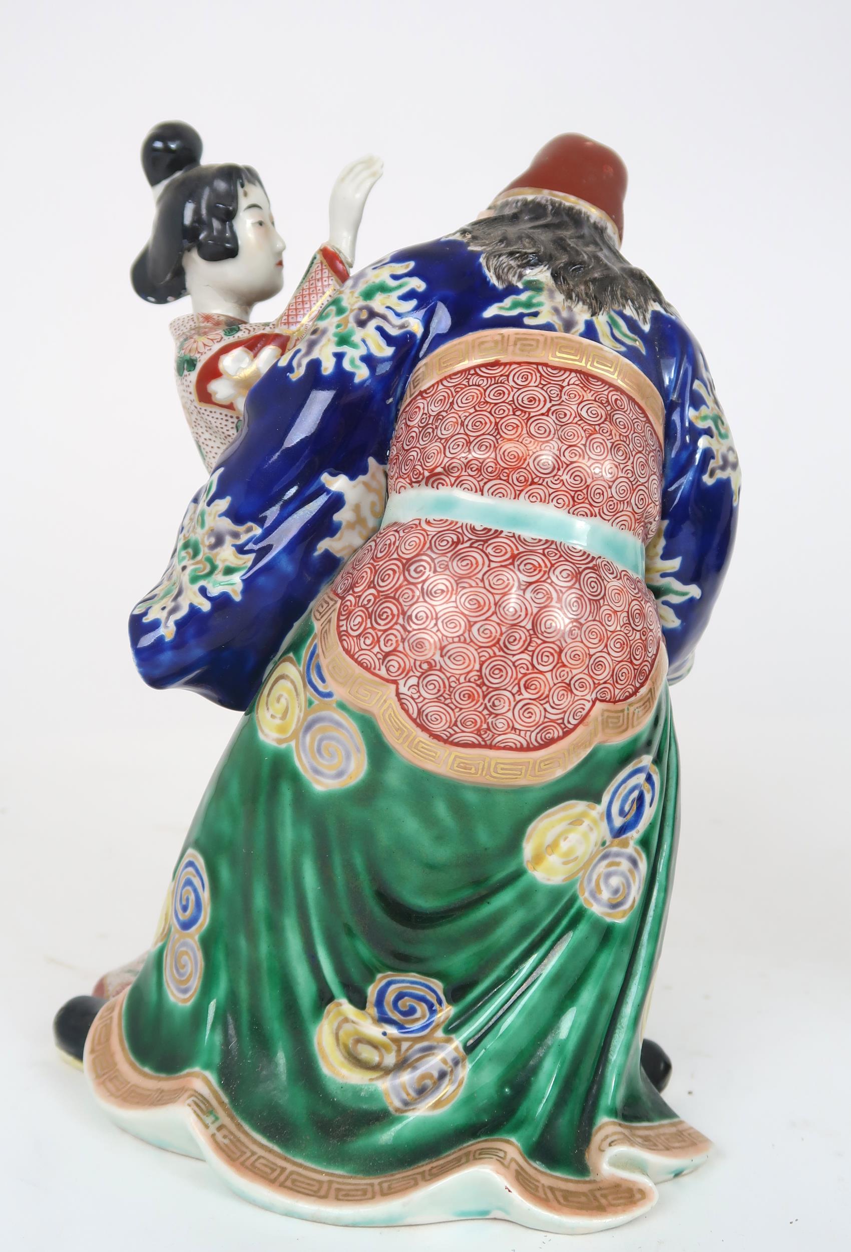 AN ARITA MODEL OF A WARRIOR AND GEISHA  She slapping his face and he grimacing, 25cm high, a Chinese - Image 5 of 18