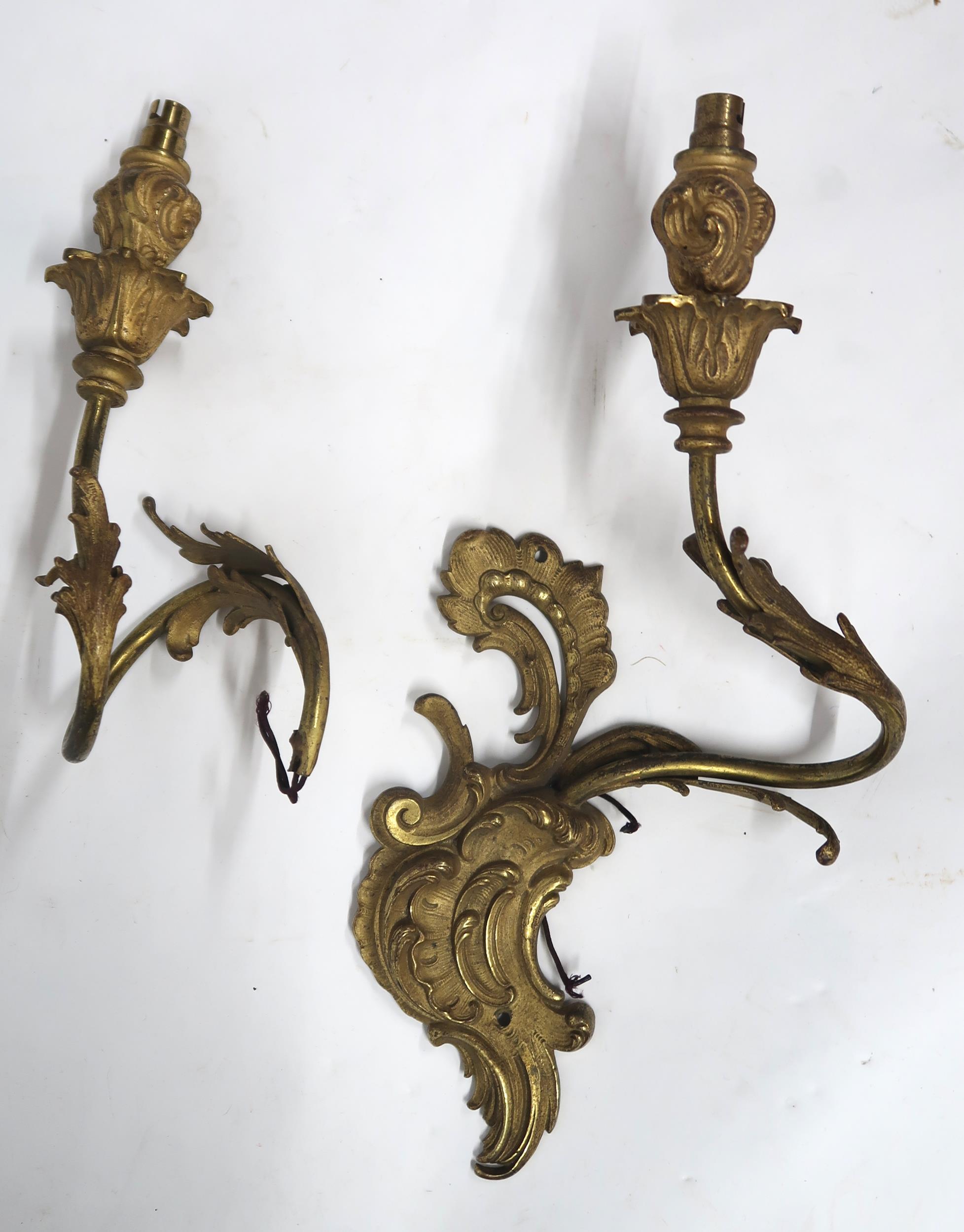 A LOT OF FIVE ROCOCO STYLE GILT METAL ORMOLU TWO BRANCH WALL SCONCES with scroll and acanthus back - Image 6 of 10